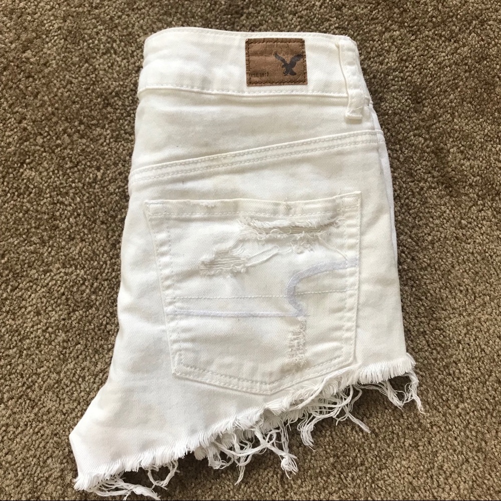 White Distressed American Eagle shorts